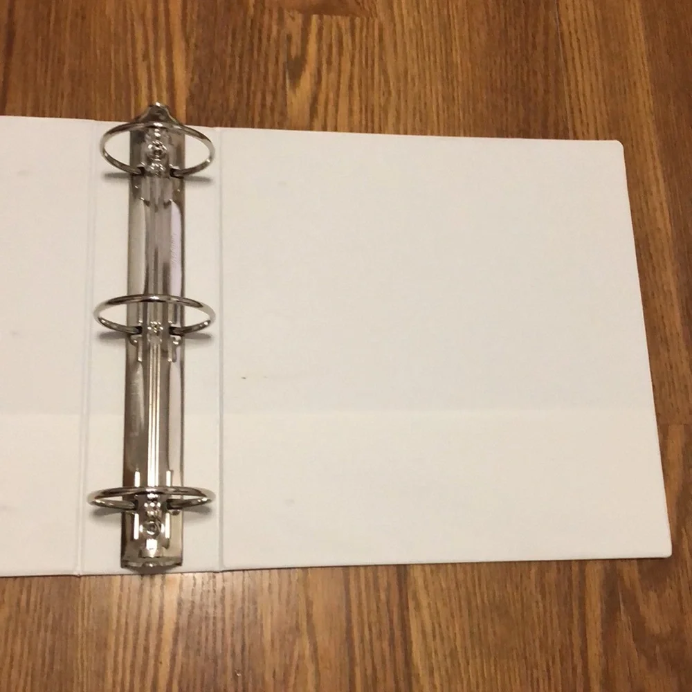 Lot of 3 white 3 ring binders